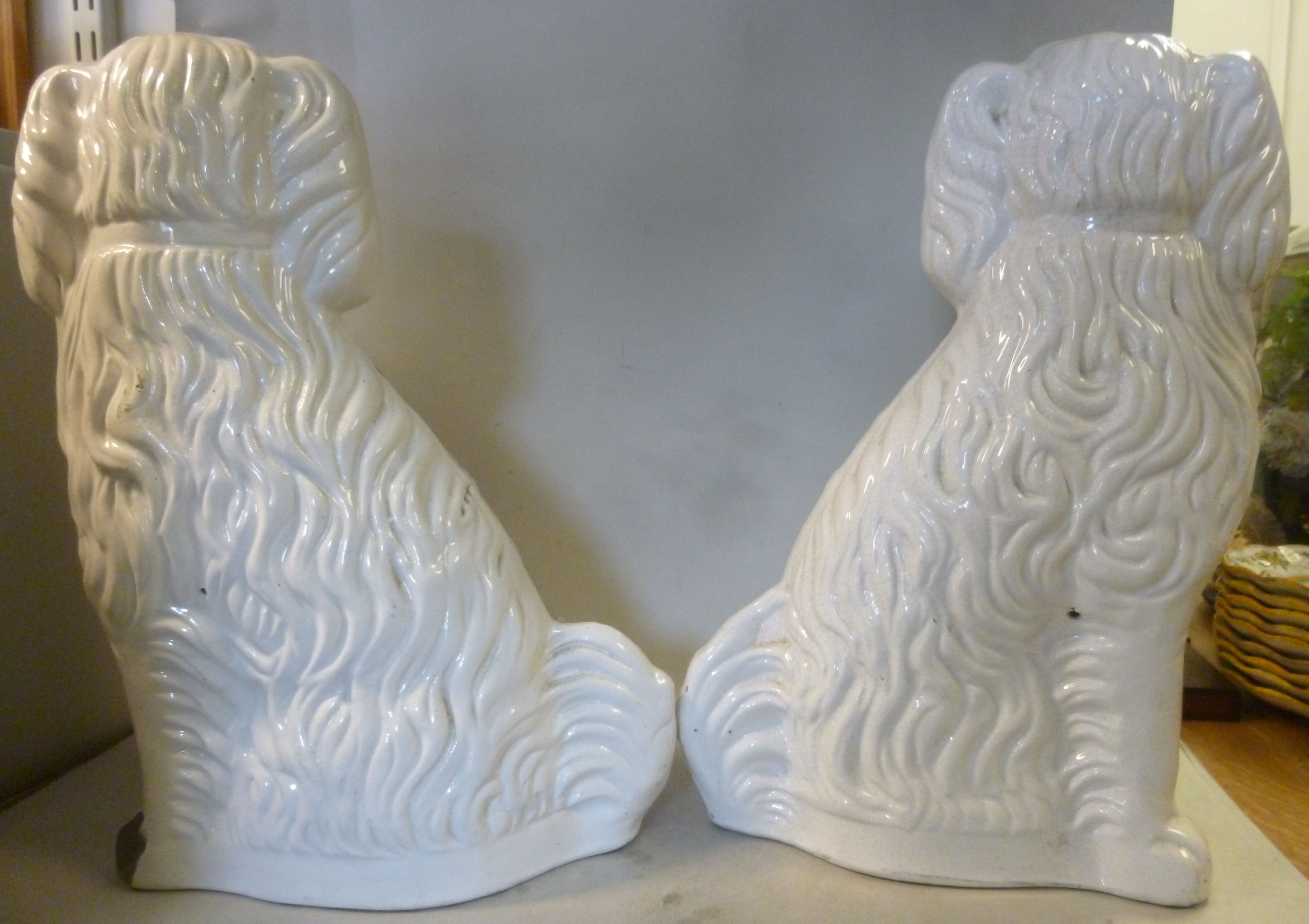 A pair of late Victorian Staffordshire ivory glazed pottery seated King Charles Spaniels with - Image 5 of 6