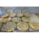 An early 20thC Cantagalli tin glazed earthenware dessert service with frilled rims,