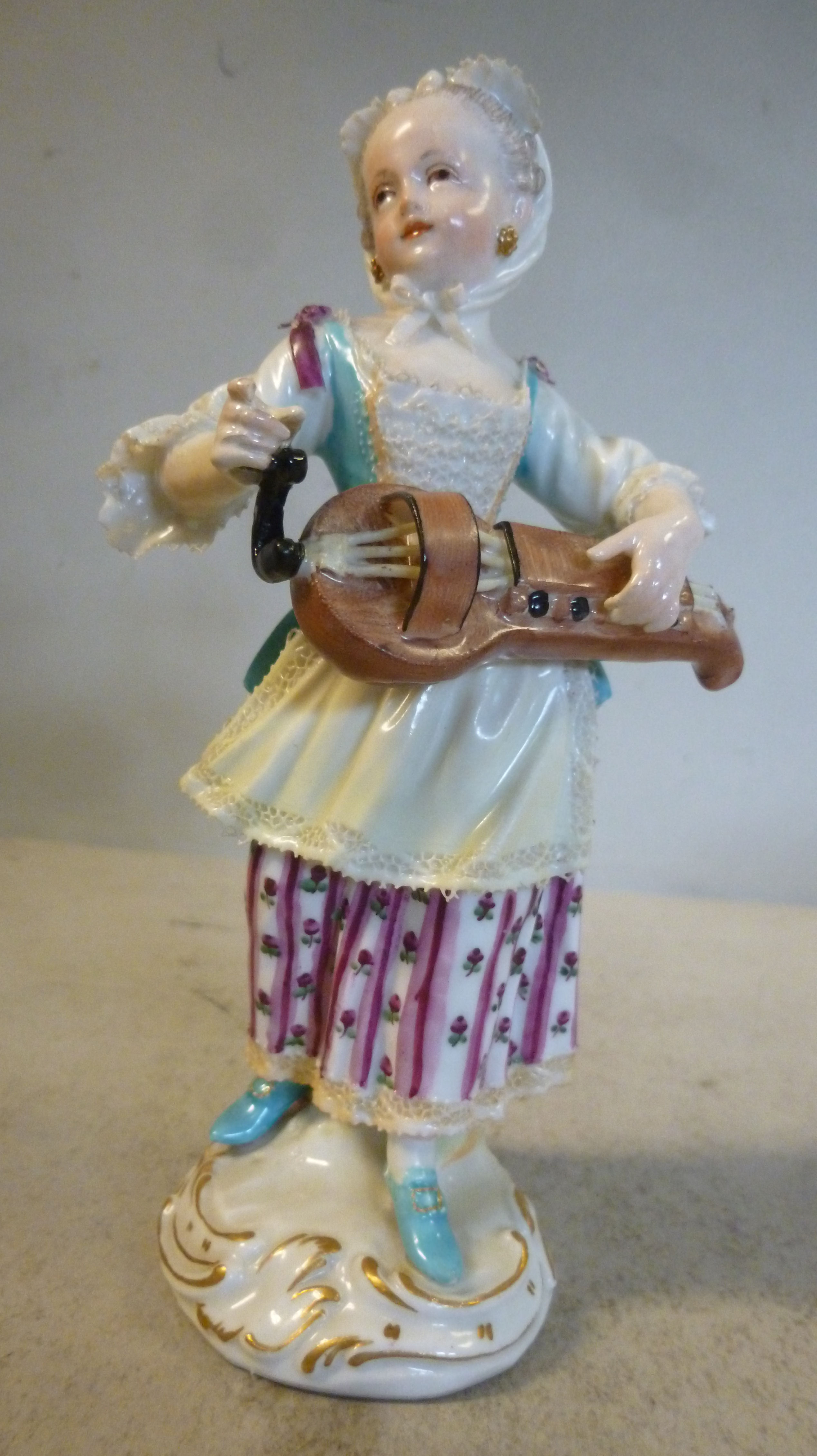 A mid 18thC Meissen porcelain standing figure by Acier, No.