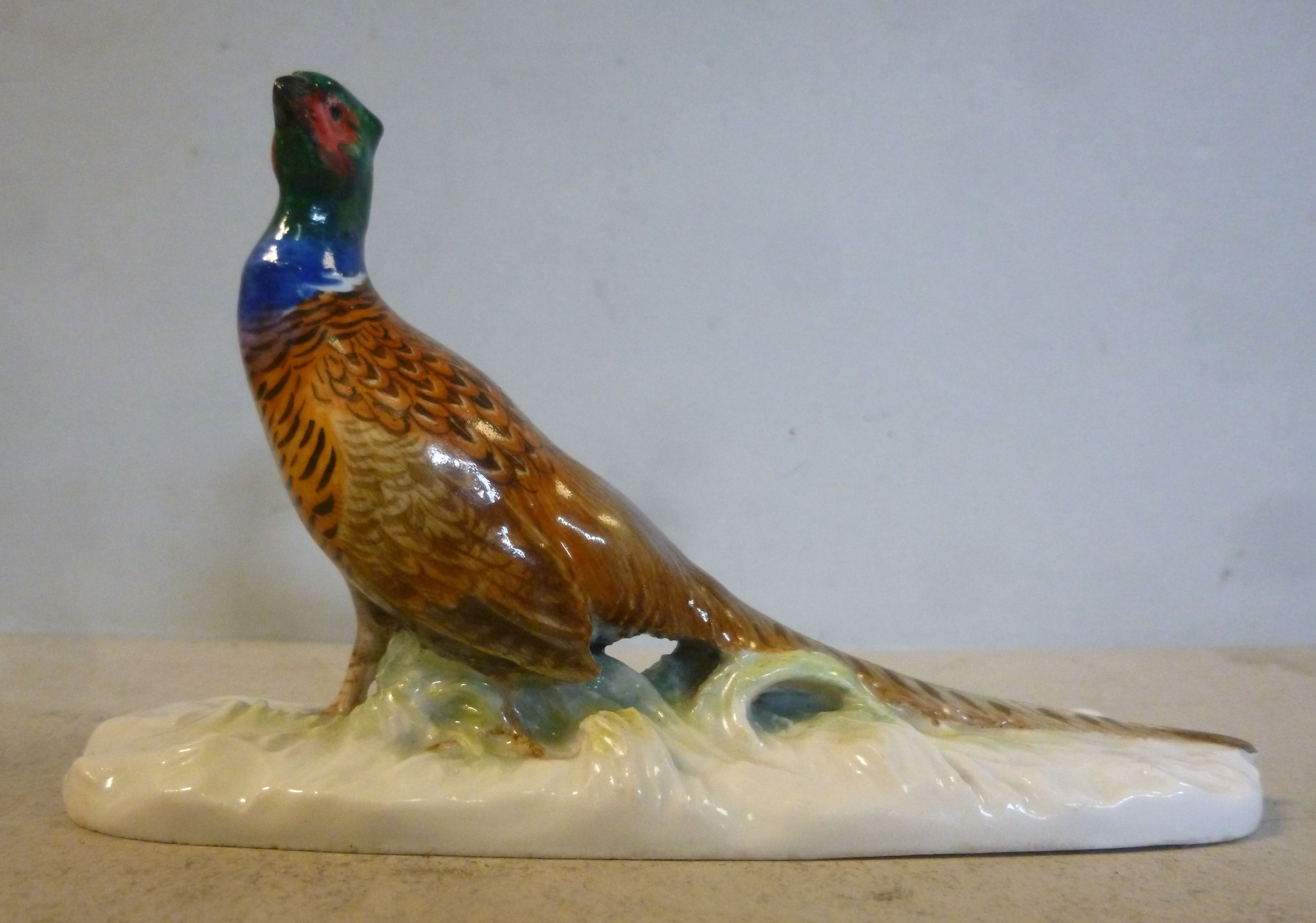 A 20thC Meissen porcelain model, a standing cock pheasant 2.