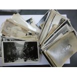 An uncollated collection of World War II postcards and photographs CS