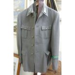 An East German military uniform tunic and trousers,