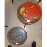 A mid 20thC Japanese inspired red lacquered pedestal wine table, decorated with birds and foliage,