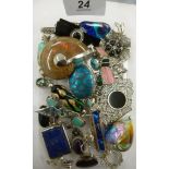 Silver mounted hardstone jewellery, mainly brooches,