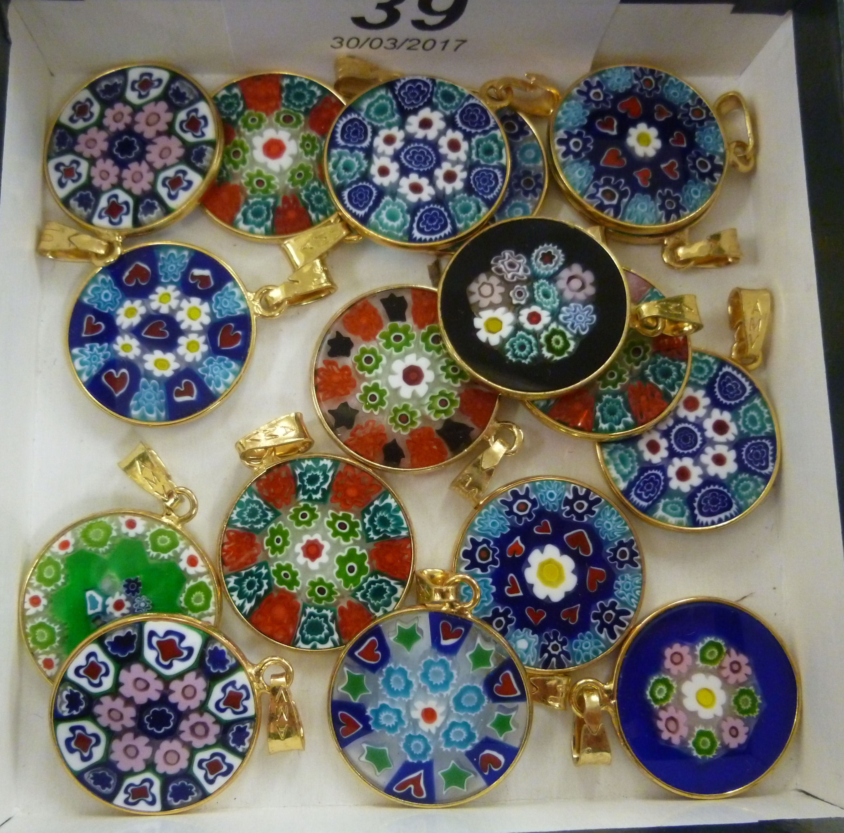 Seventeen millefiori glass necklace pendants in silver gilt mounts 11