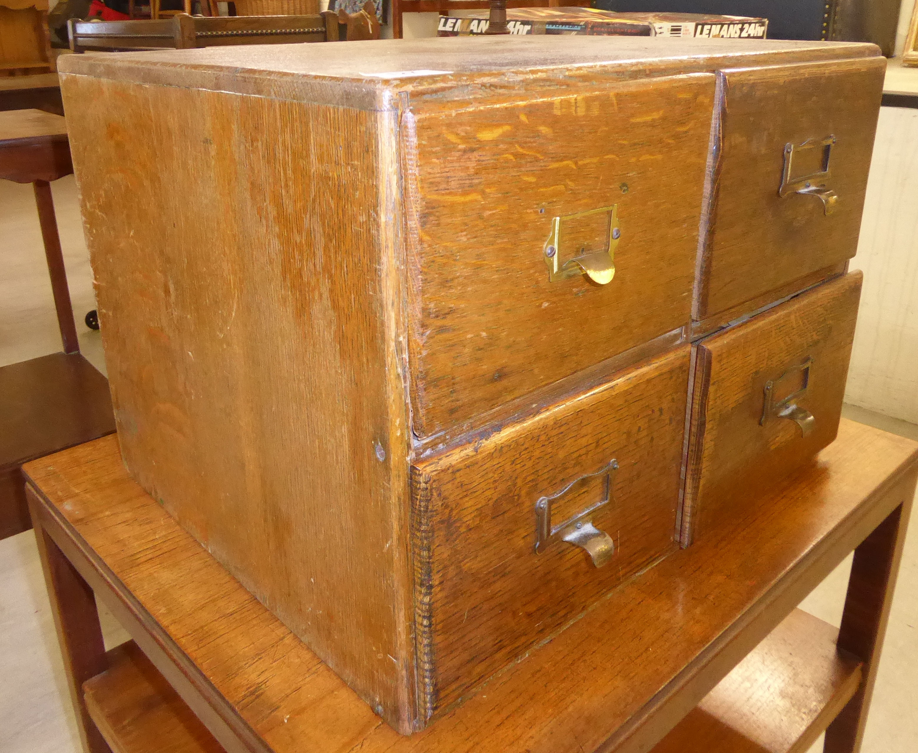 A 1920s stained oak table top, four drawer filing cabinet, - Image 2 of 2