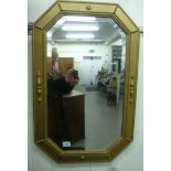 A 1920s mirror of elongated octagonal form,