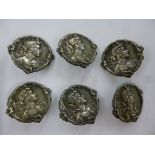 A set of six Art Nouveau silver buttons,