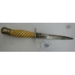 A late 19thC dagger with a spiral reed carved ivory handle the blade 5.