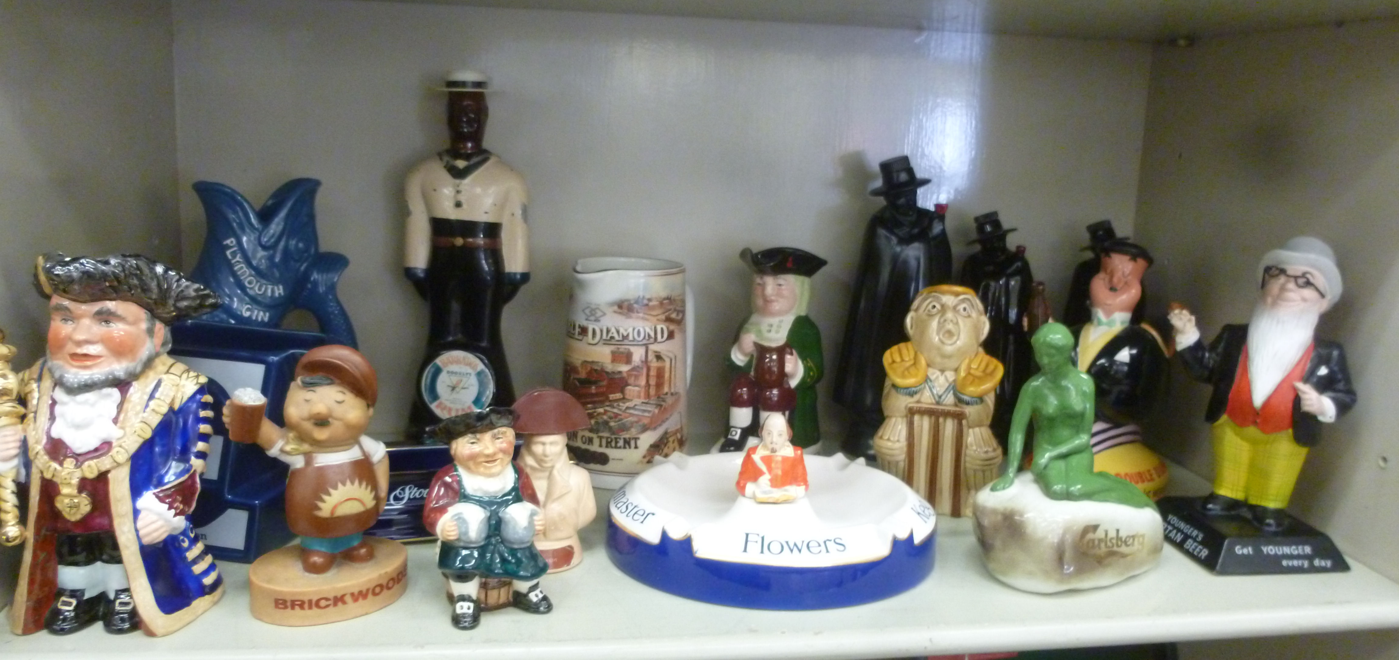 Pub related ceramic collectables: to include a Beswick china promotional figure 'A Double Diamond