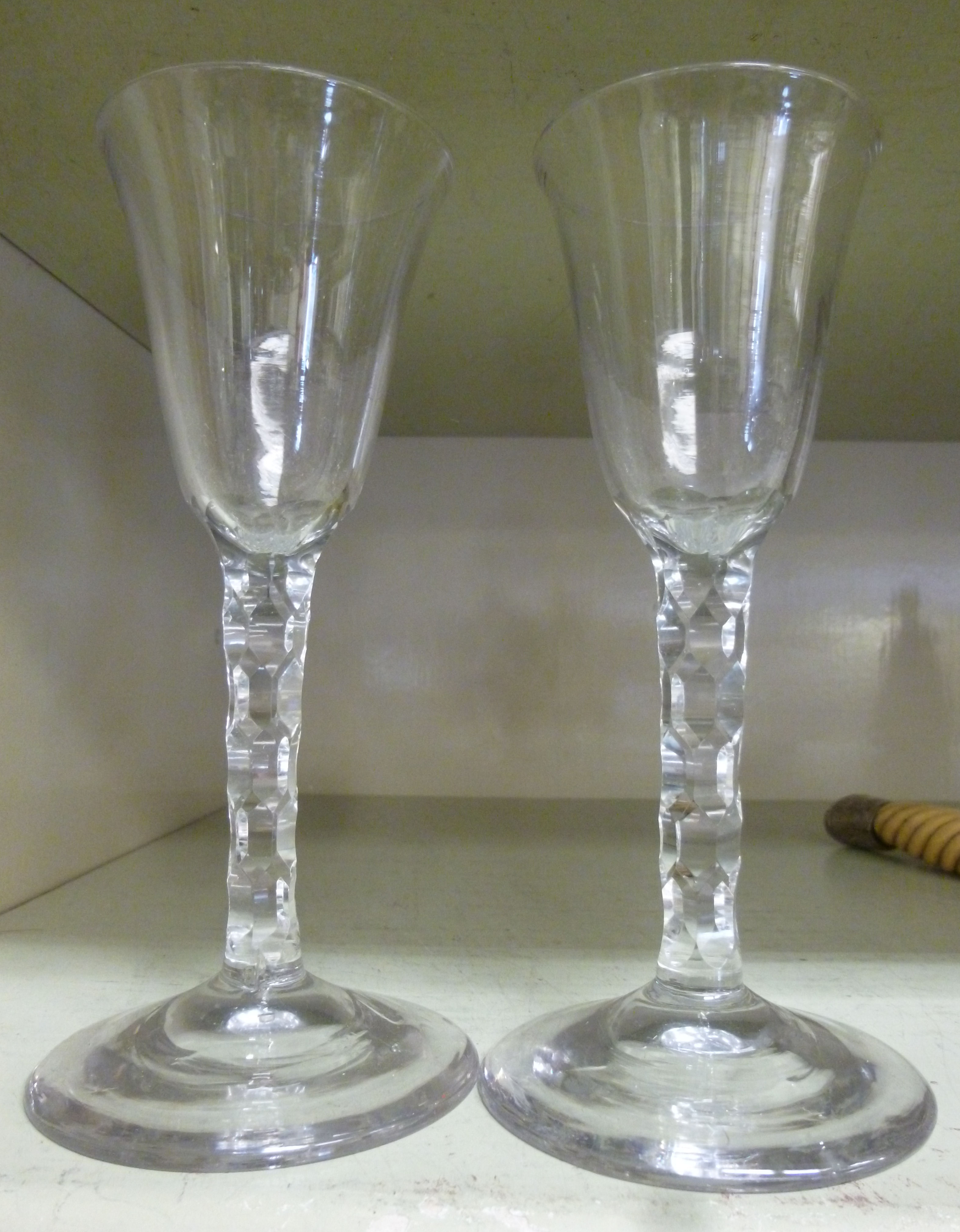 A pair of Georgian style wine glasses,