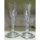 A pair of Georgian style wine glasses,