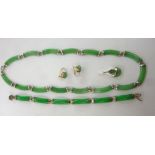 A suite of jade jewellery with silver mounts comprising a necklace, bracelet,