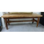 A 20thC waxed pine bench,