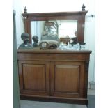 A late Victorian mahogany sideboard, having a mirrored back,