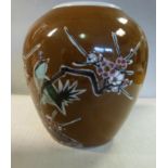 A 20thC Chinese brown glazed porcelain jar of baluster form,