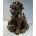 A late 19th/early 20thC brown glazed pottery model Dog of Fo 8.