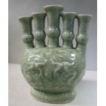 A mid 20thC Chinese celedon glazed porcelain tulip vase with five graduated funnels,