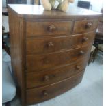 A mid Victorian mahogany bow front dressing chest with two short/four long graduated drawers,