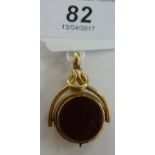A 9ct gold swivel seal,