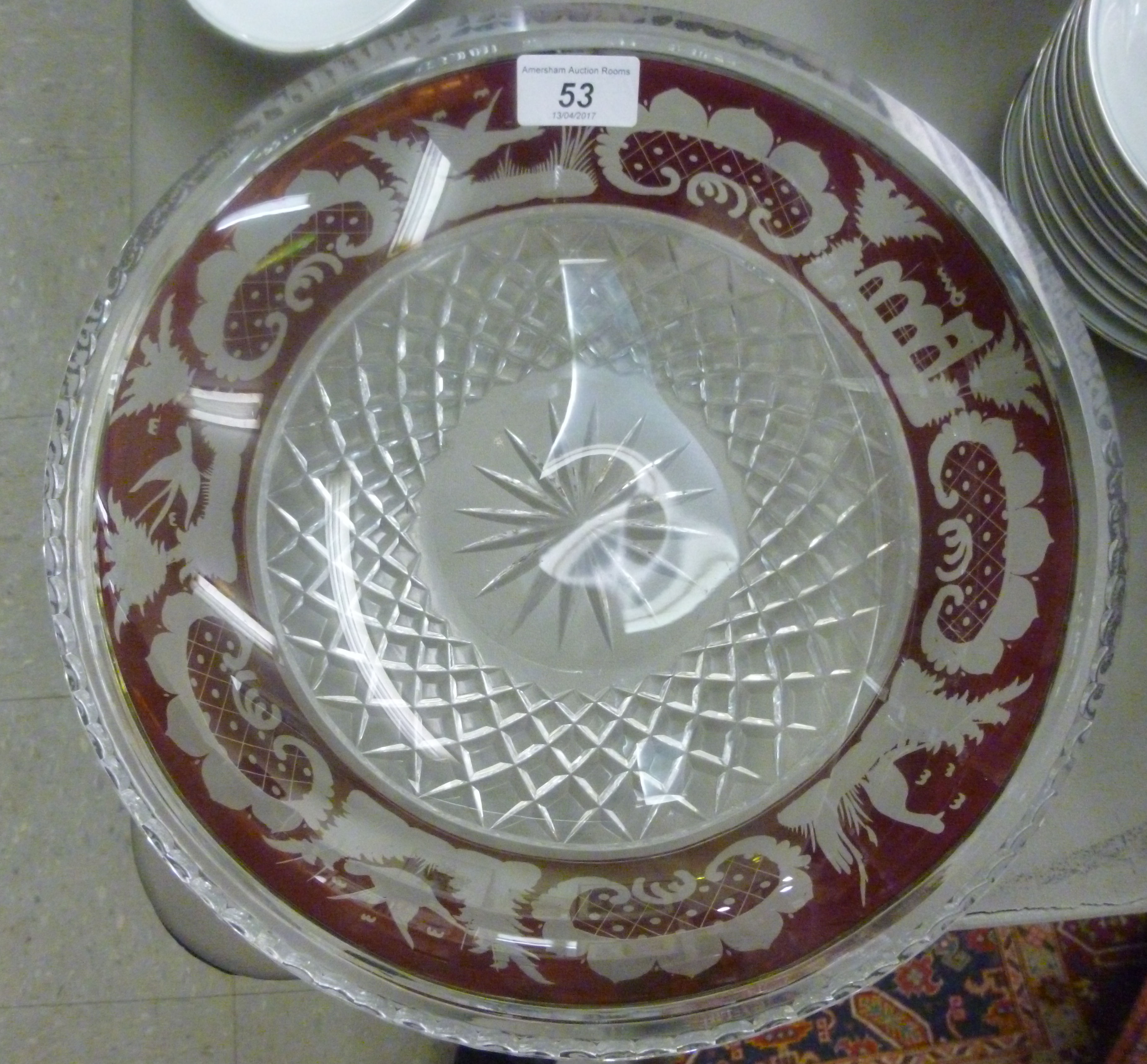 A modern Bohemian part ruby coloured, slice decorated and engraved glass dish,