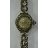 A lady's silver cased and marcasite set cocktail watch,