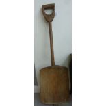 A 19thC rustically carved wooden grain shovel,