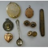 Items of personal ornament: to include a gold coloured metal pendant heart; and an oval pendant,