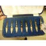 A set of eight Mappin & Webb silver plated corn on the cob skewers cased OS1