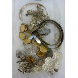 Silver and silver coloured metal items of personal ornament: to include two coin bracelets;