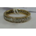 A gold coloured metal and diamond set full eternity ring 11