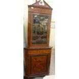 An Edwardian mahogany and satinwood inlaid standing corner cabinet with marquetry ornament,