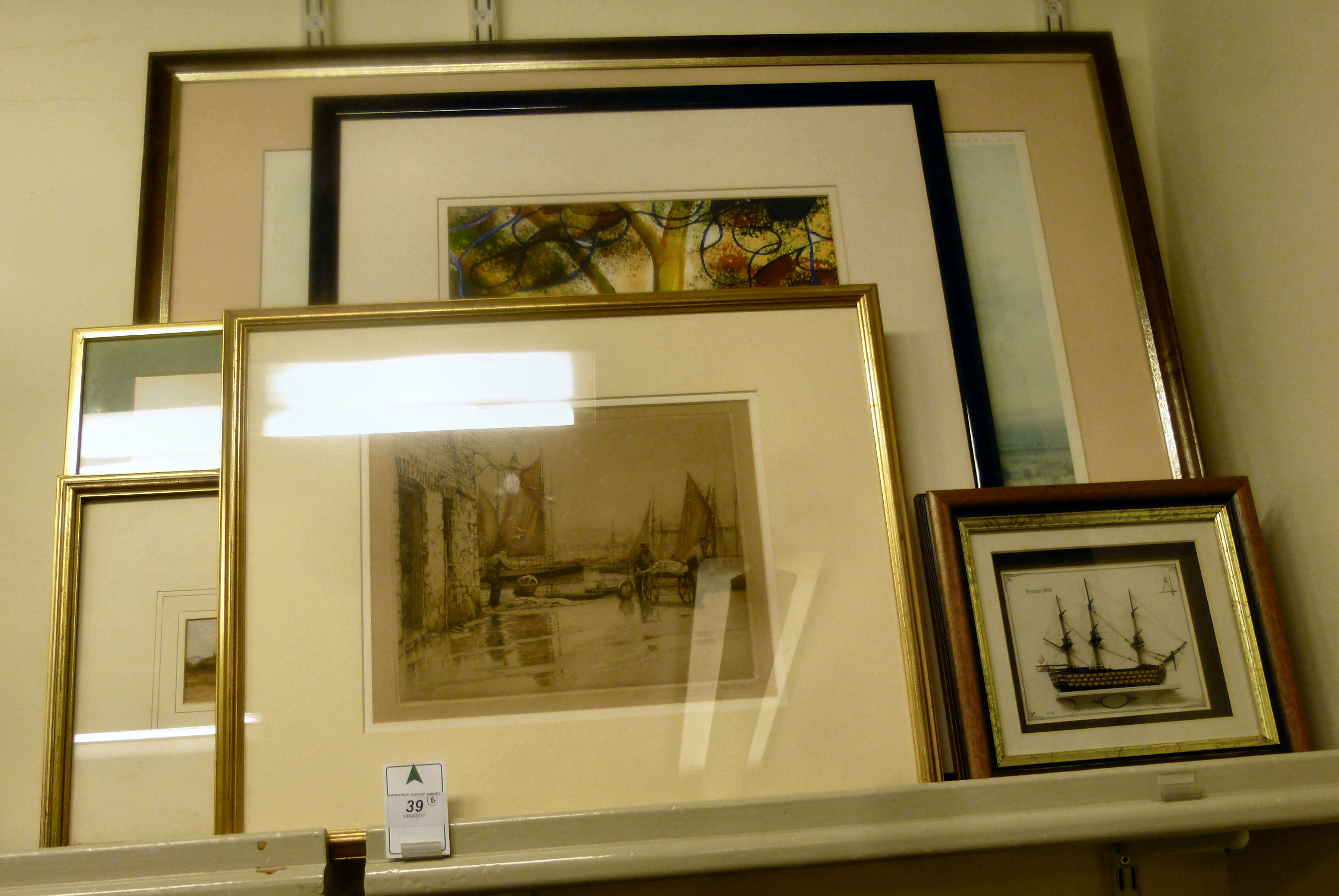 Six various framed pictures: to include after Henry Walker - a quayside with small fishing vessels