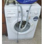 A Bosch Avantixx 6 washing machine 33''h 23.