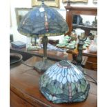 Two similar Tiffany inspired table lamps,