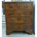 A modern Georgian inspired, figured oak finished dressing chest of diminuative proportions,