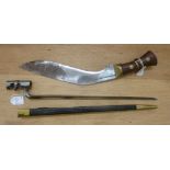 A 20thC Kukri; and a bayonet with a triform blade 17''L in a brass mounted,