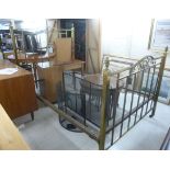 An Edwardian bedstead comprising a square section,