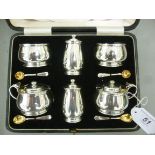 A six piece silver condiments set of squat, bulbous form,