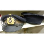 A World War II German Navy peaked cap with embroidered emblems and brass buttons OS2