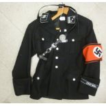 A copy of a World War II German SS black tunic with a belt CS