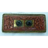 An early 20thC Chinese cast gilt metal and floral carved rectangular cinnabar brooch,