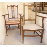 Two similar Edwardian mahogany framed parlour elbow chairs with pierced splats,