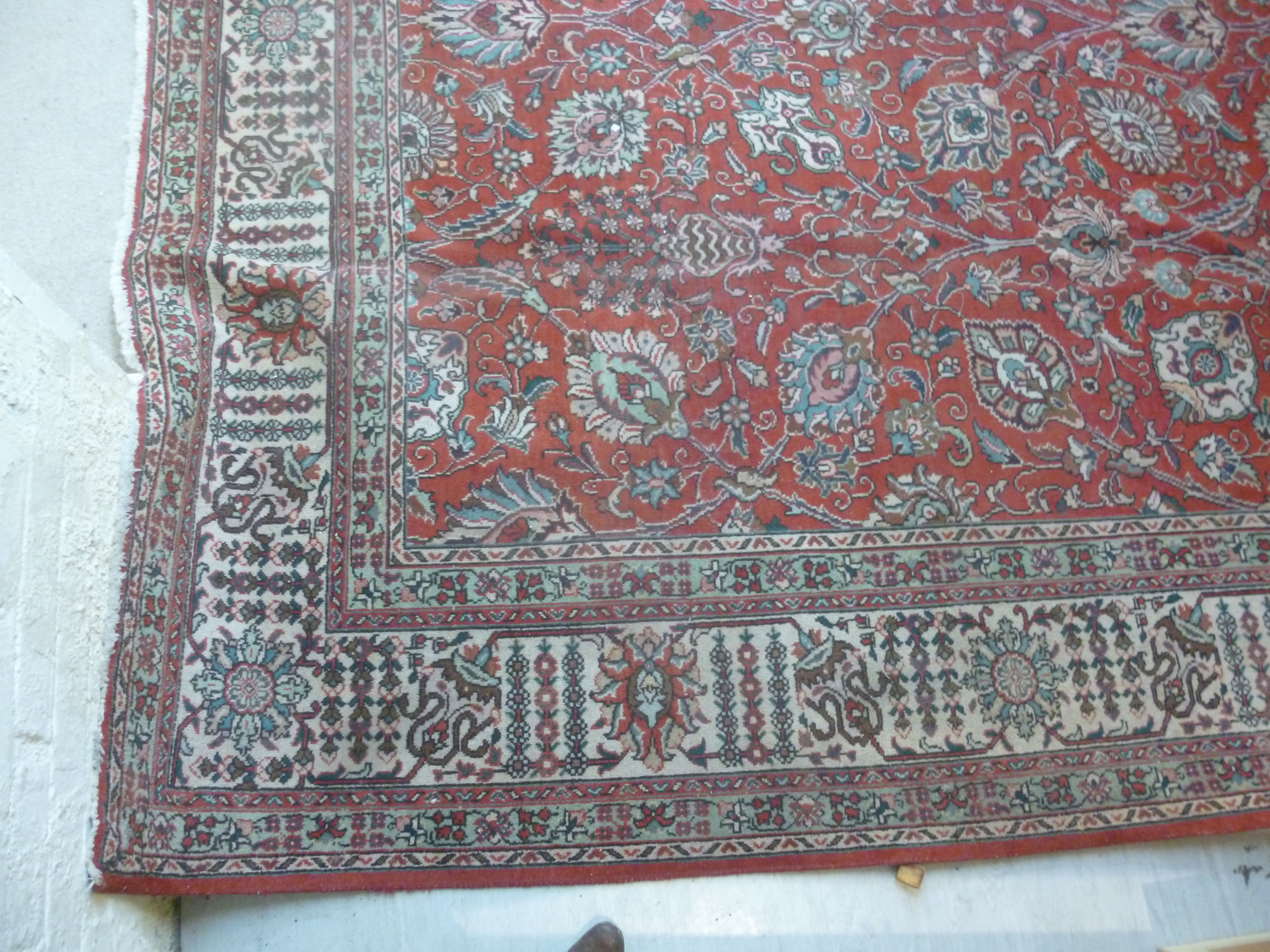 A Persian carpet with stylised designs bordered by foliage 333'' x 296'' - Image 2 of 7