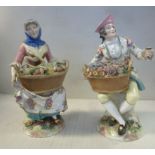 A pair of mid 19thC Austrian porcelain seated figures, a young man and woman,