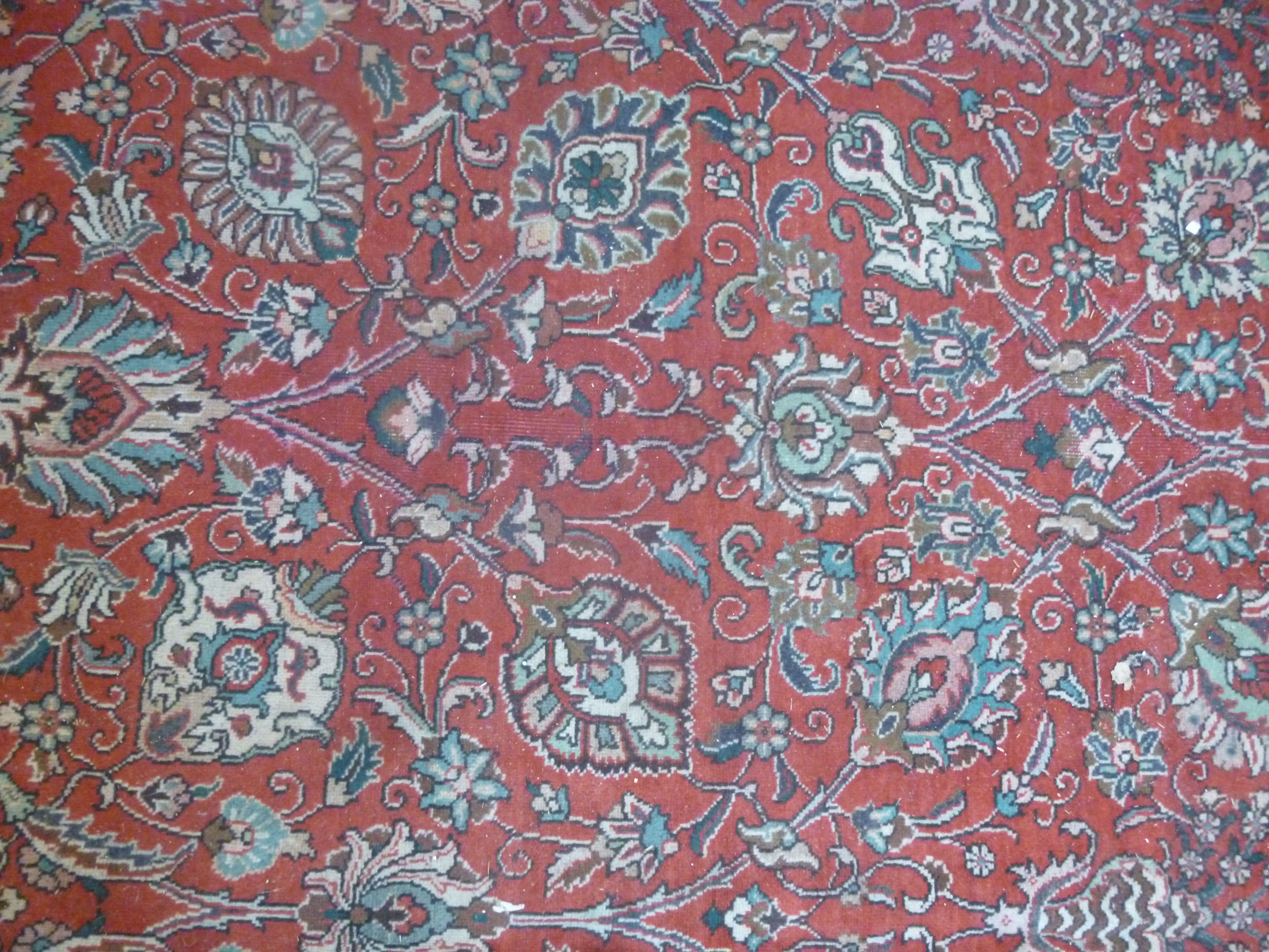 A Persian carpet with stylised designs bordered by foliage 333'' x 296'' - Image 6 of 7
