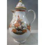 A mid 19thC Austrian porcelain jug of ovoid form with a loop handle, spout and domed cover,