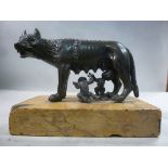 A late 19thC cast and patinated bronze model, Romulus and Remus with the She-Wolf,