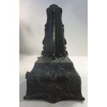 A late 19thC Continental pewter finished alloy cased metronome, decorated with cast foliate,