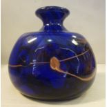 An Art Glass opaque dark blue and black vase of squat, oval, bulbous form with a narrow neck,